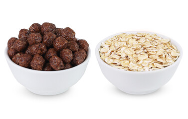 Oat flakes and chocolate corn flakes on an isolated white background. Morning breakfast