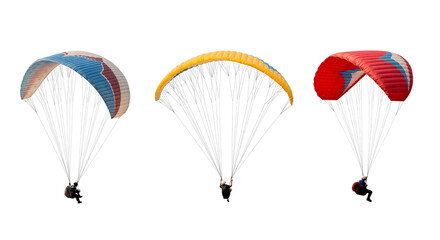 collection Bright colorful parachute isolated on white background,  The sportsman flying on a paraglider. Concept of extreme sport, taking adventure challenge. - obrazy, fototapety, plakaty