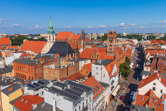 view of the old town of Torun and the Vistula river from above during a warm summer day.