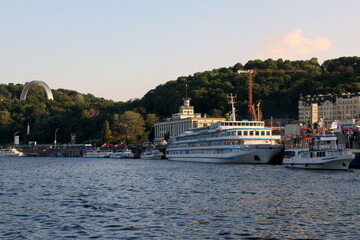 Ukraine Kyiv river Dnieper on the water summer evening sunset