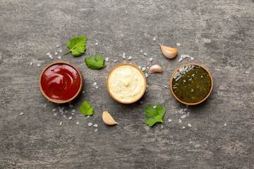 Many different sauces and herbs on table, flat lay top view. sauces with spices healthy concept