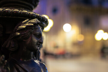 Statues of Women at the Quattro Canti Four Corners of Palermo in the historical old town in Sicily, Italy, Europe before Sunrise at night