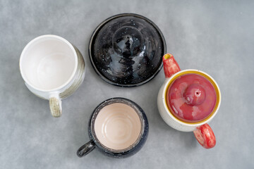 Ceramics, a ceramic product made with their own hands, made on a potter's wheel, jug, mug, clay, glaze.