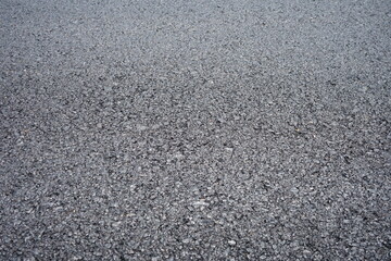 The blur of the asphalt road