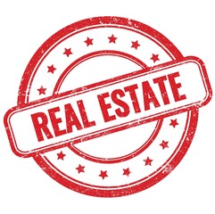 REAL ESTATE text on red grungy round rubber stamp.