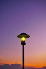 Street lamp post with twilight sky background