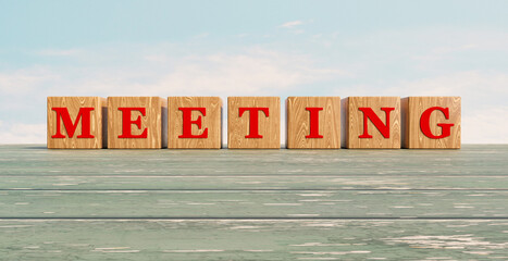 Meeting - business meeting or video conference. Wood dice with red letter on old weathered wooden planks. 3d illustration