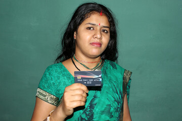 woman holding a credit card
