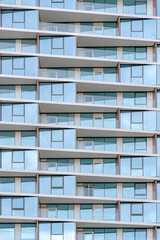 Glass building with glass railing on the balconies at Silicon Valley, San Jose bay area, California