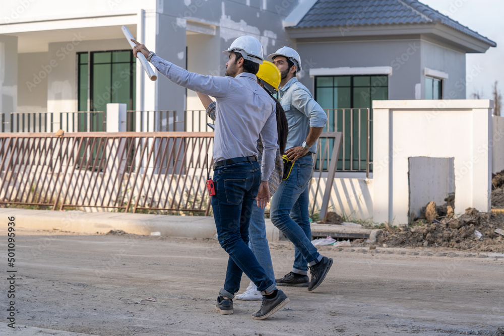 Aufkleber Architect and engineer discussing planning for a building a new home at construction site,Architect watching some a construction,Business, Building,Industry,People concept.