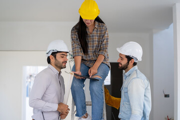 Architect and engineer discussing planning for a building a new home at construction site,Architect watching some a construction,Business, Building,Industry,People concept.