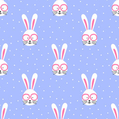 Seamless pattern with cute bunny in glasses on blue polka dot background. Vector design for textile, wrapping paper, greeting cards.