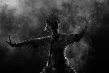 Half body of Asian Woman wear Thai Traditional Costume Dancer with beautiful design dress silhouette