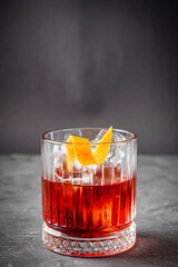 bright colored alcoholic cocktail on a black stone background