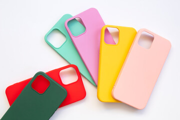 Cases set for smartphone on white background. Silicone protection for mobile phone. Colorful...