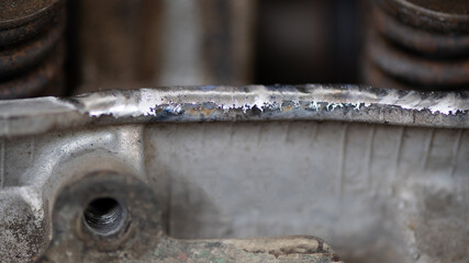 Welding of stainless steel with argon arc welding. Welding TIG. Color welding seam.