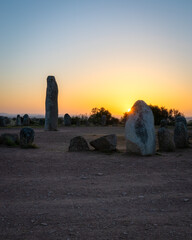 Stone menhirs at Cromeleque do Xerez in Monsaraz, Portugal at sunrise