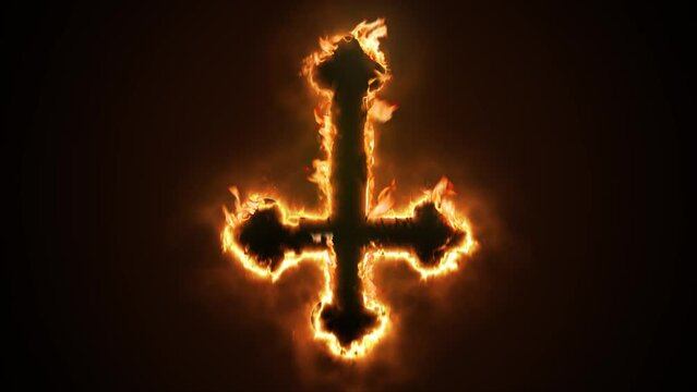 Exciting and highly emotive reveal animation of an ornate inverted satanic Crucifix cross, in roaring flames, burning embers and sparks, on a smokey, glowing black background