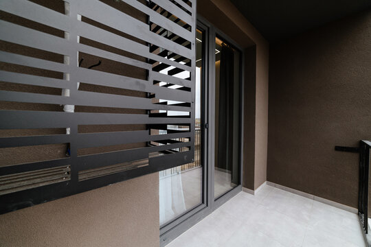 modern balcony with large glass doors in the new house