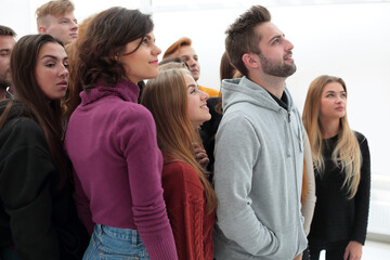 successful group of young doctors standing in the hospital lobby