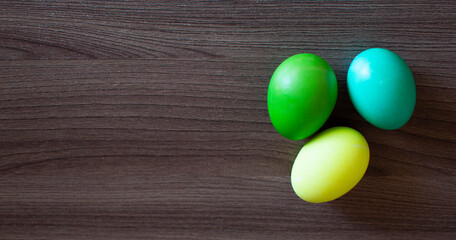 Easter eggs on wooden background