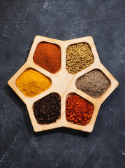 Spices, herbs, spicy and seasoning. in a wooden box top view. Spices background