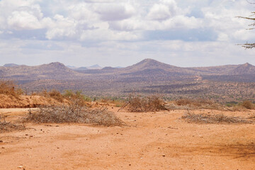 Scenic view of arid landscapes against sky at Nanyuki, Kenya