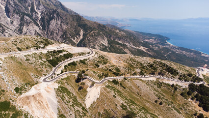road in the mountains on the Llogara pass in Albania. - obrazy, fototapety, plakaty