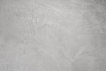 Textured white background. Decorative wall plastering, external facade finishing. The texture is gray.