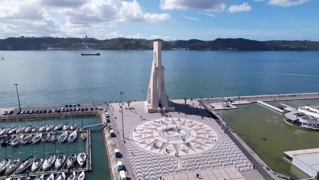 DRONE AERIAL FOOTAGE: The Padrao dos Descobrimentos (Monument to the Discoveries) is a monument on the bank of the Tagus River in Lisbon, Portugal.