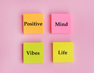 Positive Mind ,Vibes ,Life Text on Sticky Notes on Pink Background 