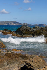 The ocean crashing into the rocks of St Thomas.