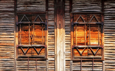 Closed wooden shutters on window