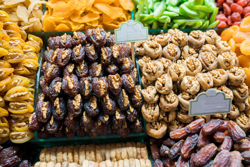 Close up of display with traditional turkish delights, dried fruits and nuts at Egyptian Bazaar. Best delicious turkish foods to try on trip to Istanbul. Selective focus