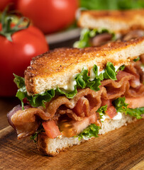 Bacon, lettuce and tomato sandwich cut in half