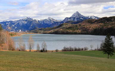 View over Weissensee lake and the Alps. Bavaria, Germany, Europe.