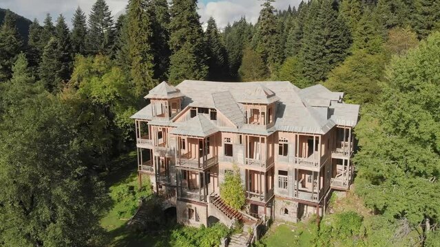 Aerial summer view at old wooden house in Shovi village, Racha, Georgia