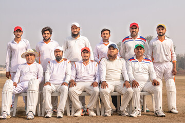 cricket team posing on match ground