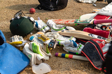 cricket ball with bags on the match ground 