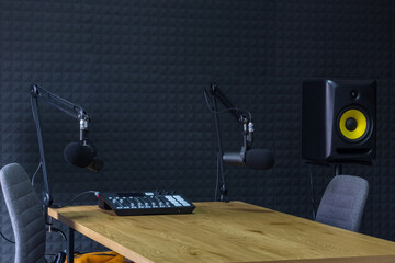 Podcast recording studio, with microphones and equalizer for recording online radio broadcasts,...