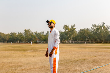 young cricketer on match ground