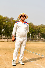 cricket team player on the stand on the match ground view  