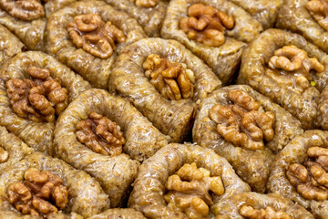 Walnut baklava. Close-up of baklava in a tray. local name cevizli bulbul yuvası baklava