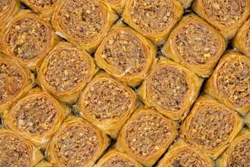 Walnut baklava. Close-up of baklava in a tray. local name cevizli saray sarma baklava