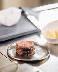 Raw beef fillet steak on restaurant kitchen