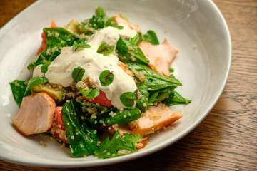 Grilled spicy lamb and salad wrapped in flatbread, with tomatoes