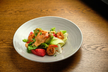 Grilled spicy lamb and salad wrapped in flatbread, with tomatoes