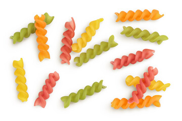 raw Fusilli colored pasta, isolated on white background with clipping path and full depth of field. Top view. Flat lay