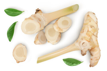 Fresh galangal root with slices isolated on white background with clipping path and full depth of field. Top view. Flat lay