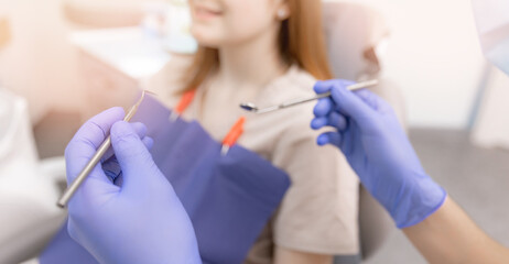 Stomatology banner, young woman client at reception dentist in chair